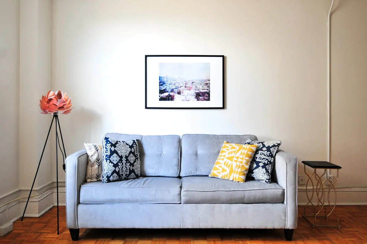 Warm living room chair next to a window
