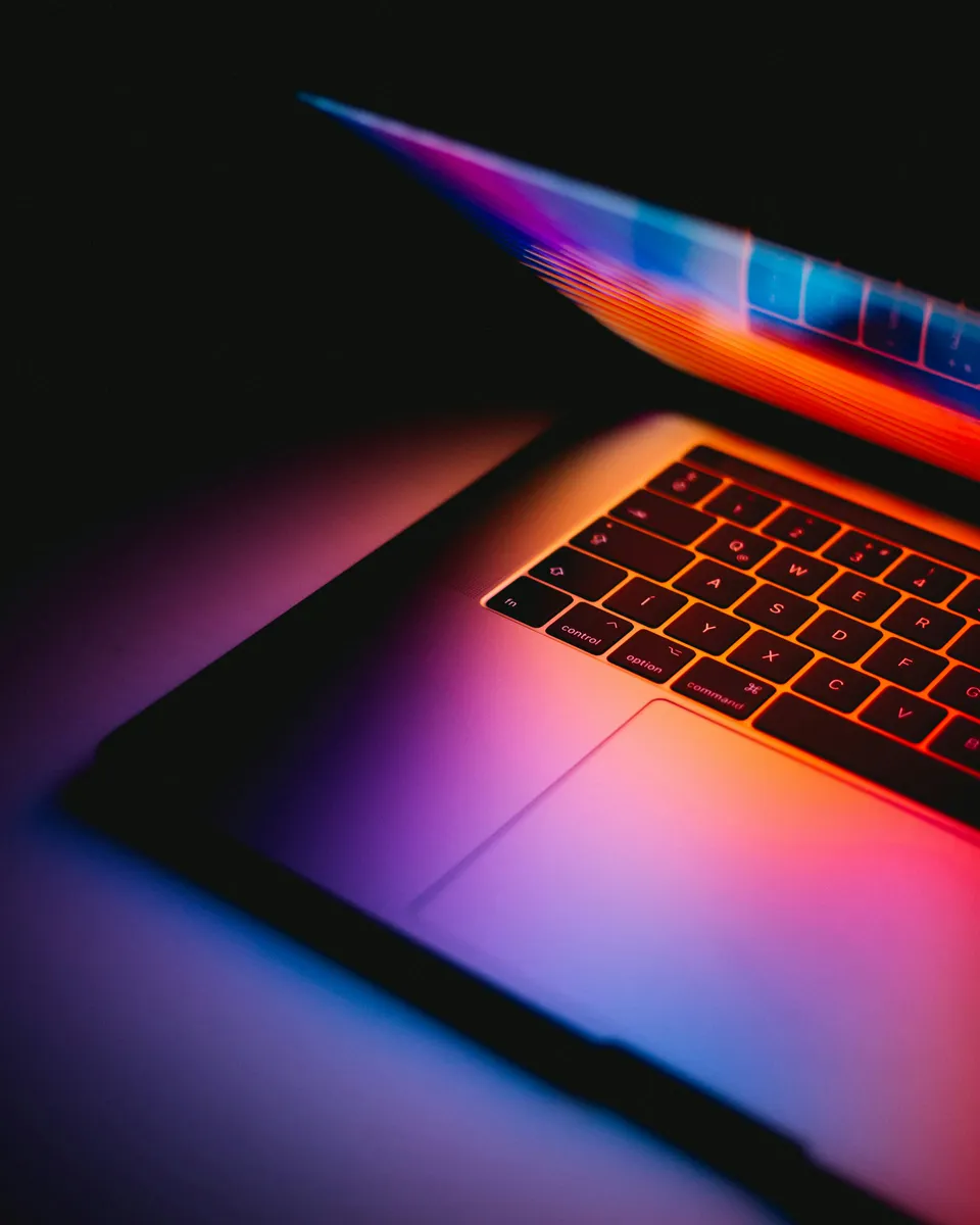 Two laptops compared by screen and hardware configuration