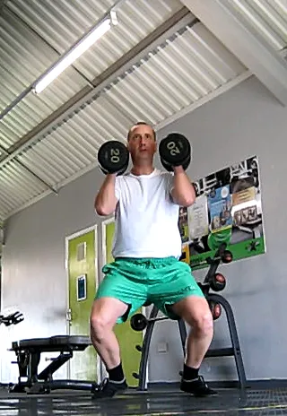 Illustration of a dumbbell exercise movement