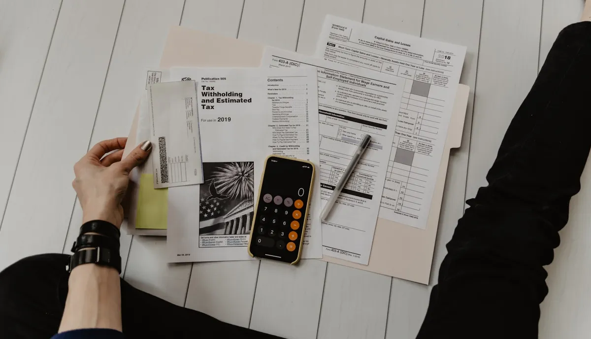 Person reviewing subscription costs and payment details
