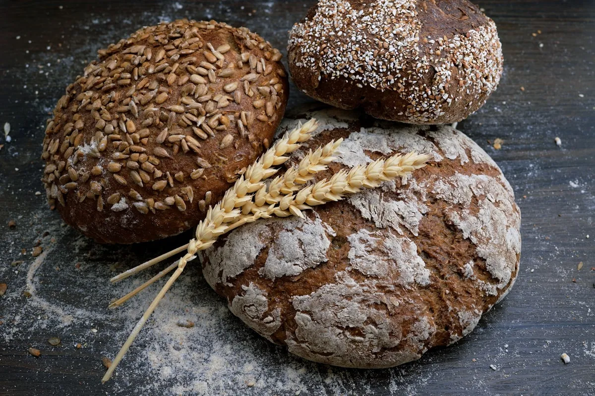 Fresh bread and baking ingredients on a kitchen counter