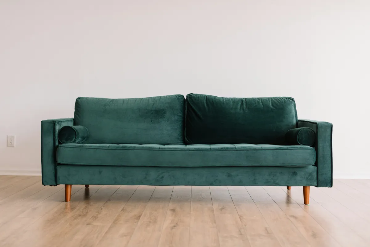 Sectional sofa placed in a measured living room
