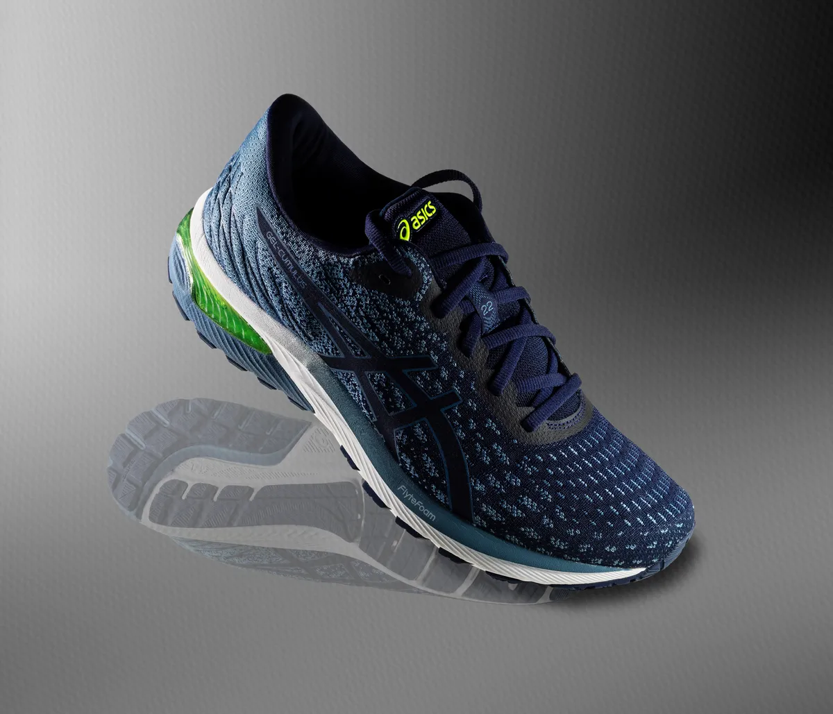 A cushioned neutral road running shoe viewed from the side