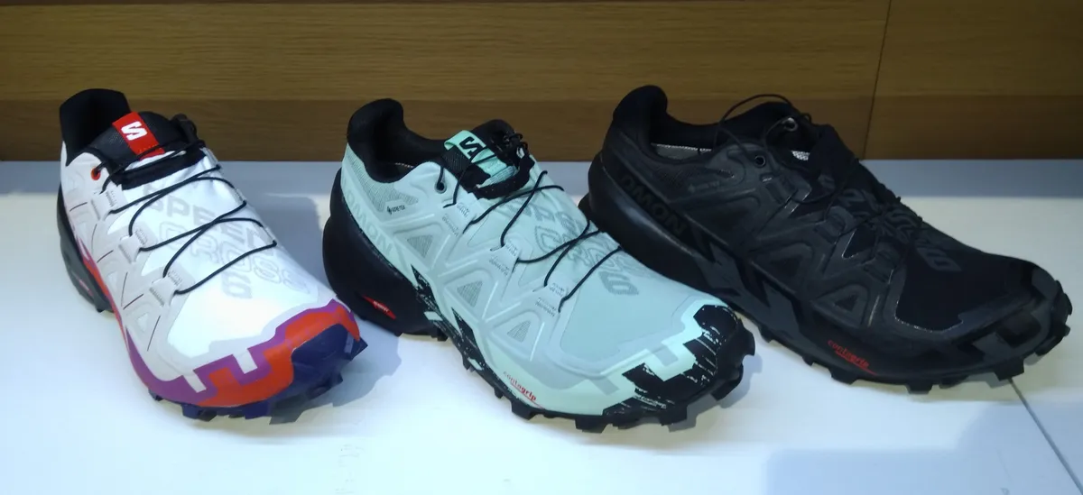 Trail running shoes with deep lugged outsoles