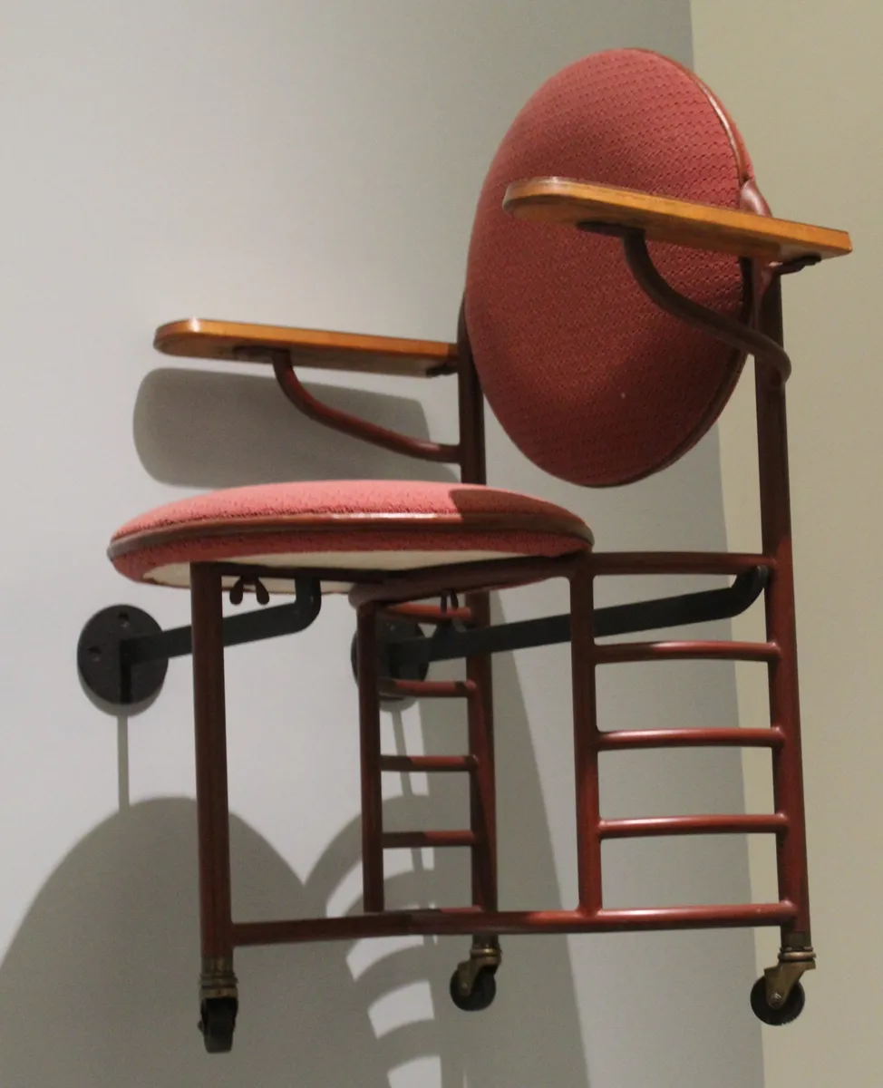 A designer desk chair displayed in a museum