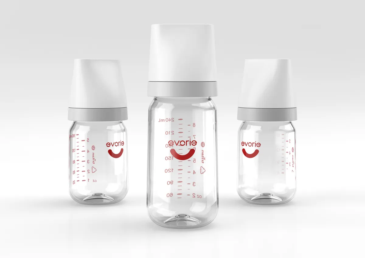 Several baby bottles with teats