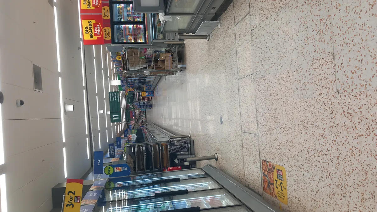 A supermarket aisle stocked with products