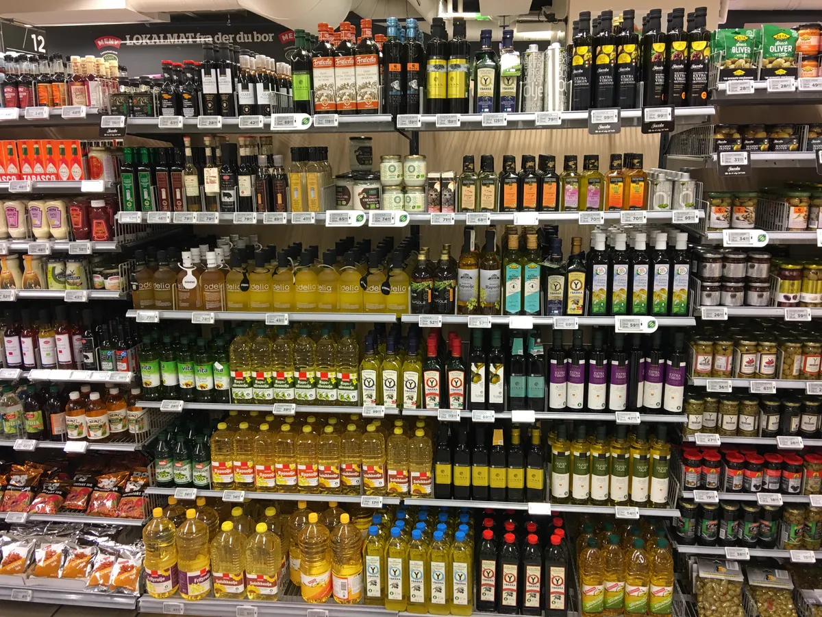 Cooking oils and staples on a supermarket shelf