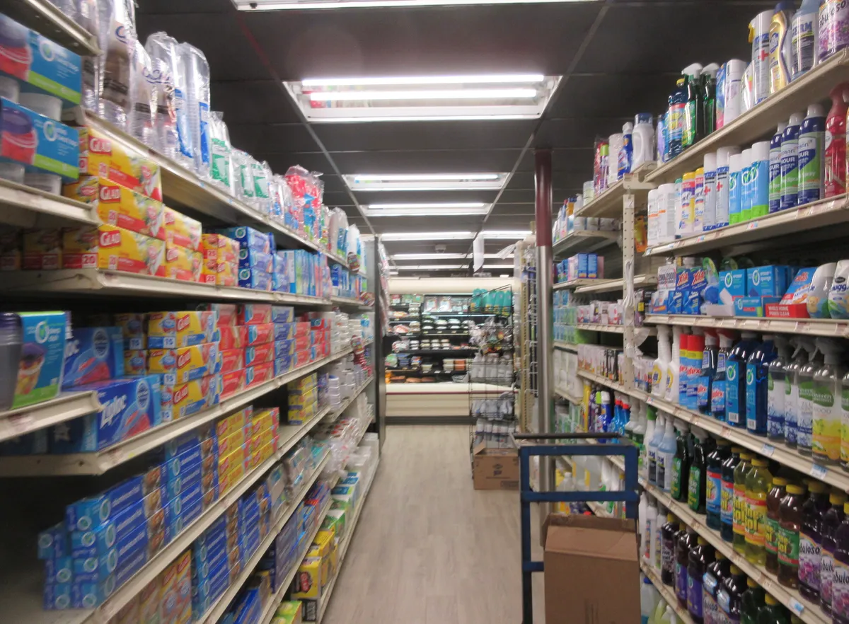 The centre aisle of a neighbourhood supermarket