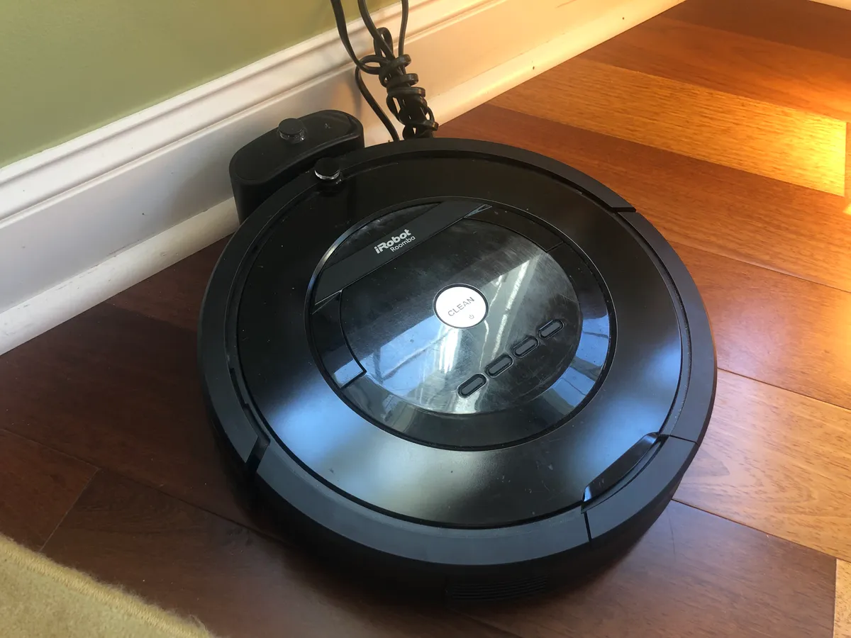 Robot vacuum docked and charging at its base station