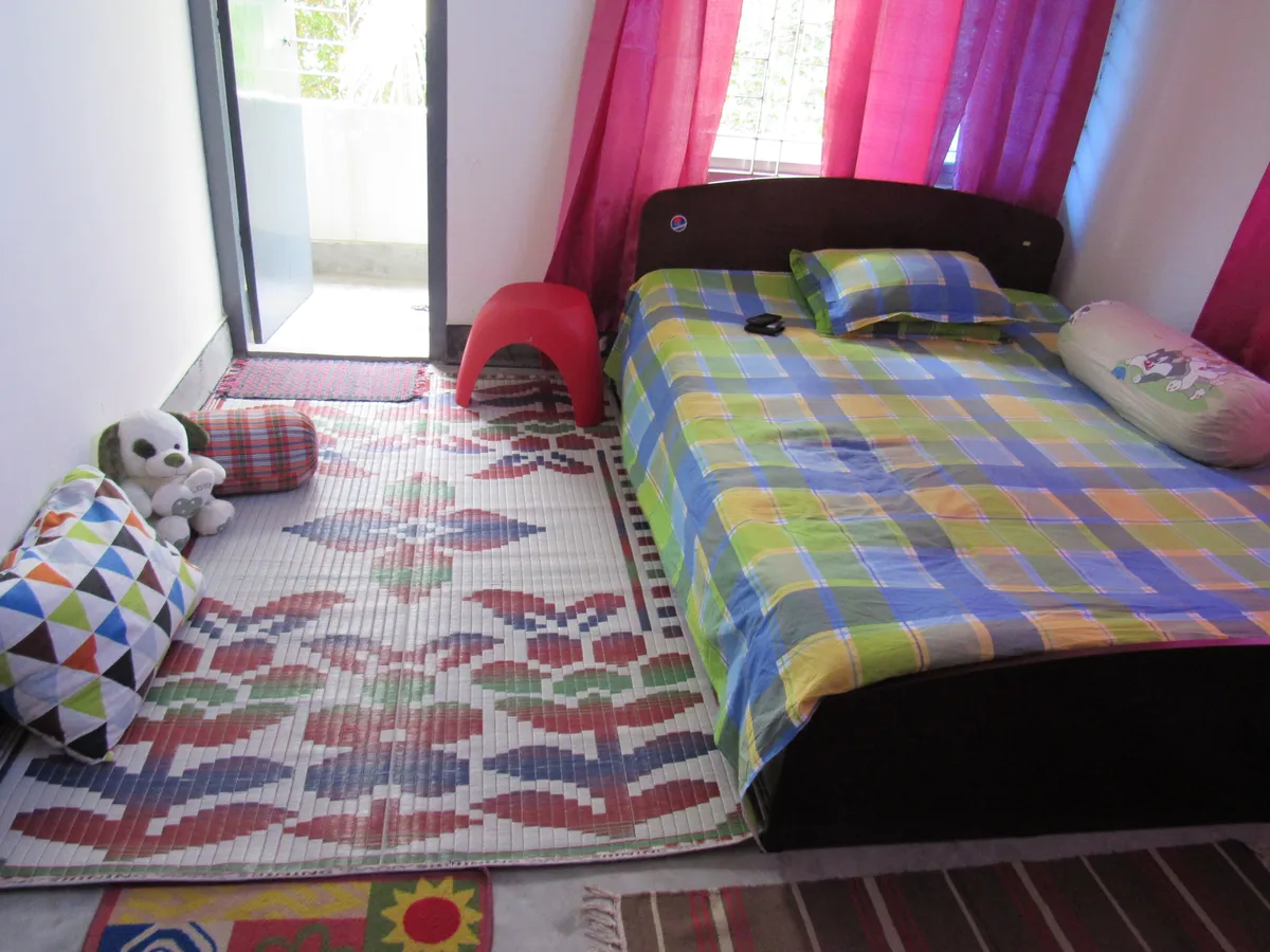 Pillows arranged on a neatly made bed