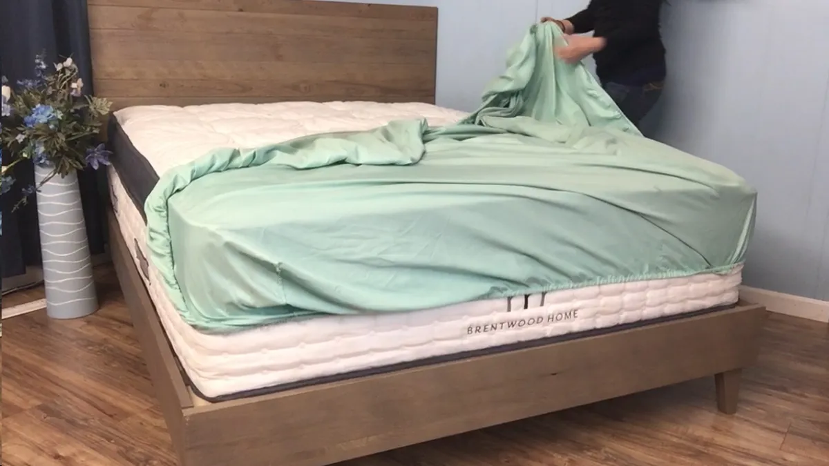 A fitted sheet with elasticated corners