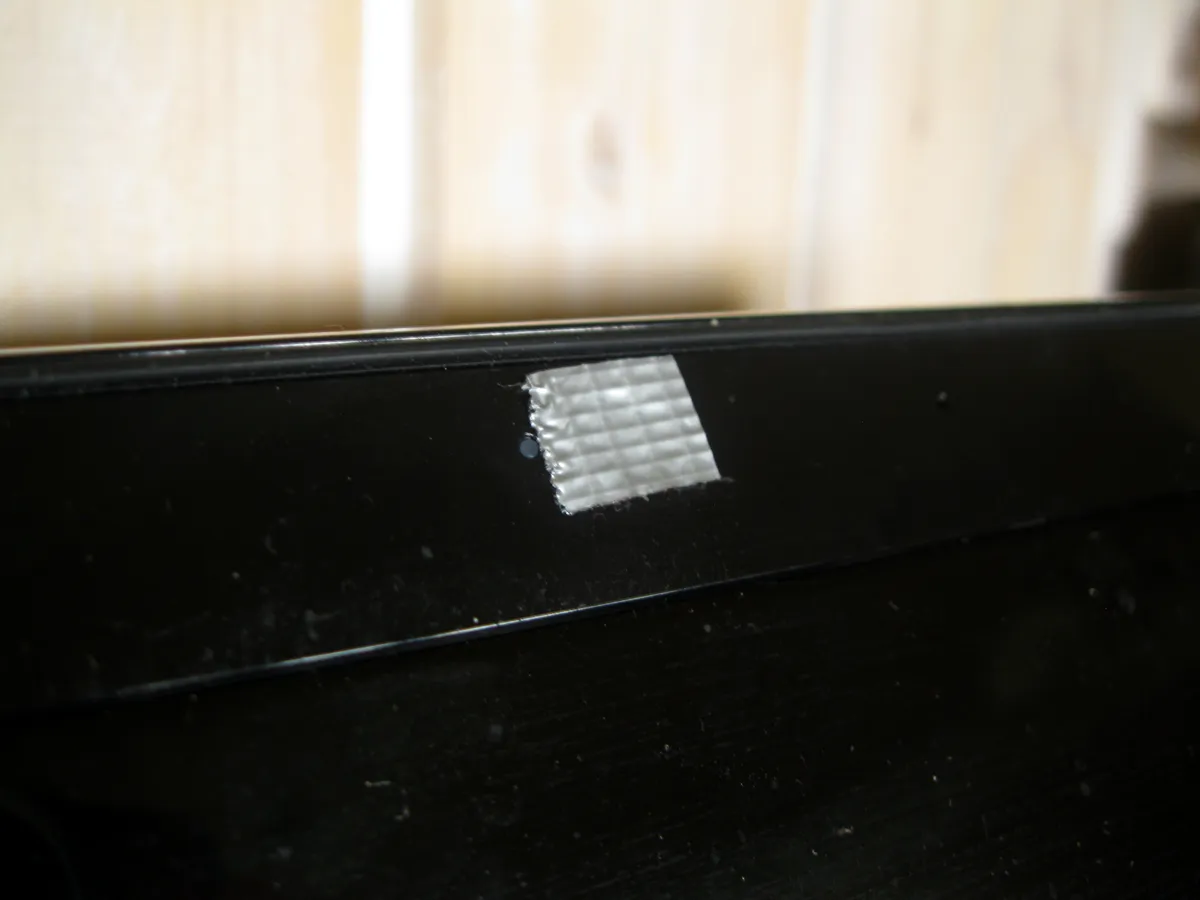 Tape covering a laptop webcam as a privacy measure