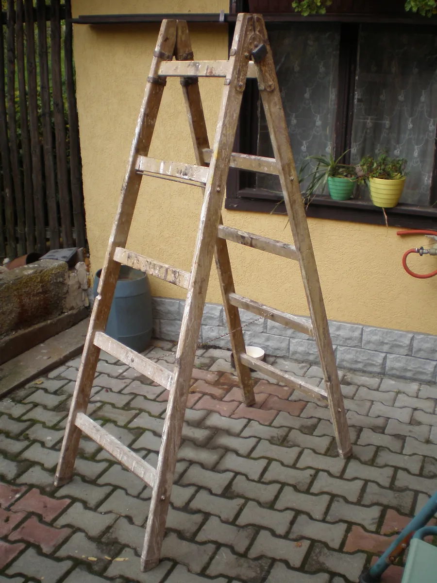 A folding aluminium stepladder in the open position