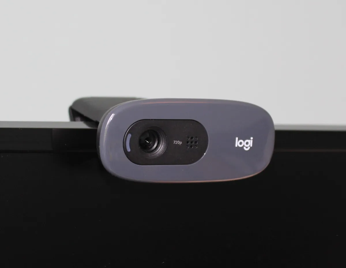 A webcam mounted on top of a computer monitor