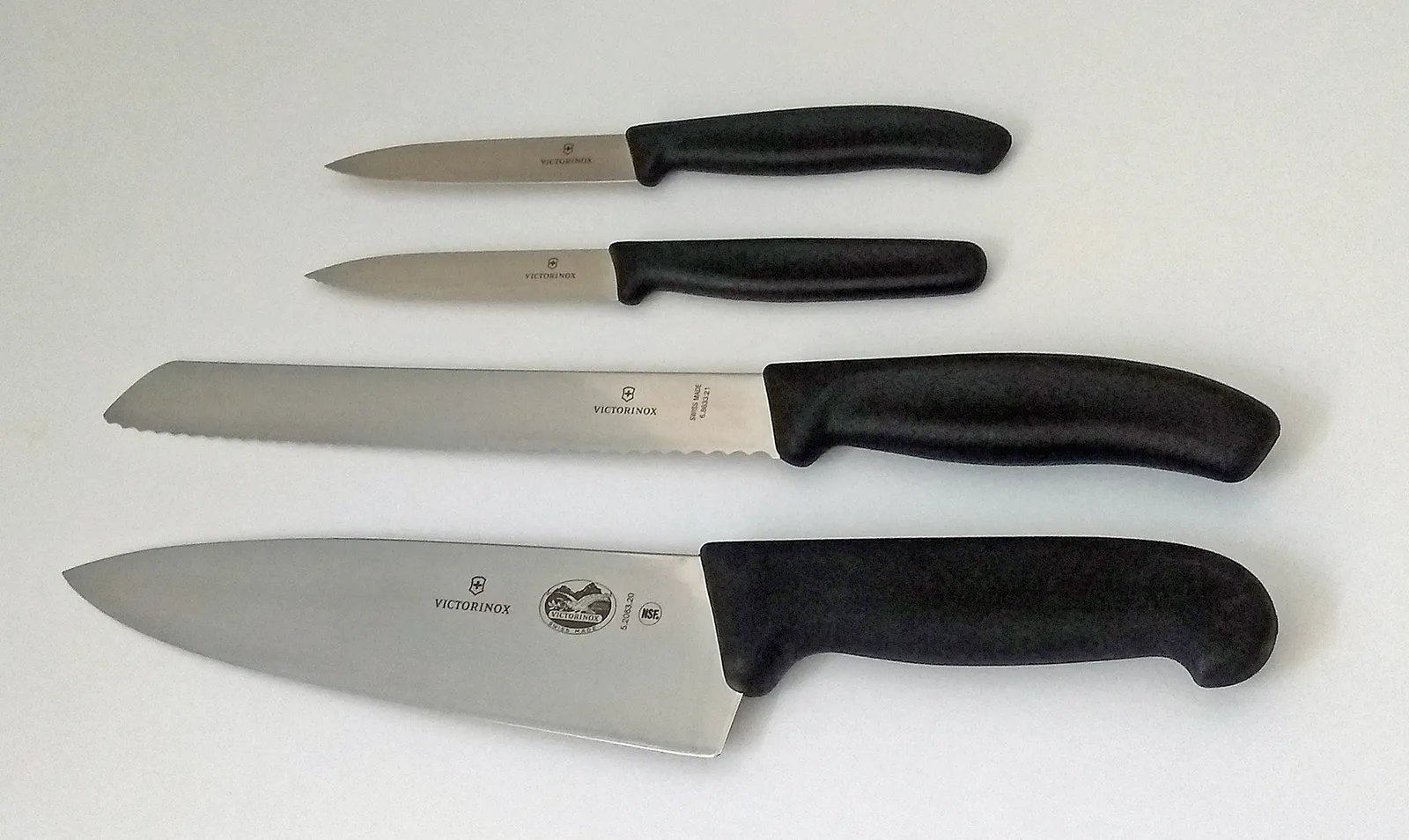 A selection of kitchen knives with moulded handles