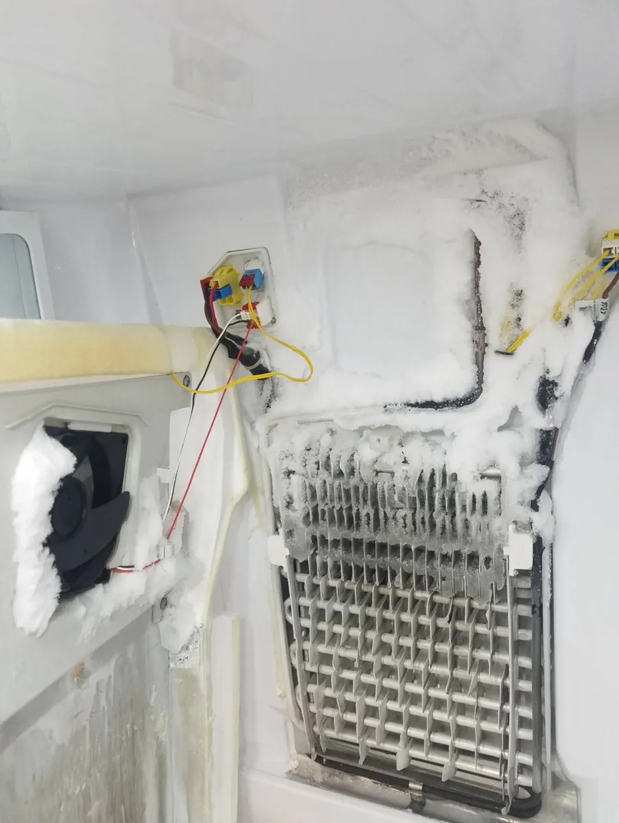 Ice build-up inside a refrigerator compartment