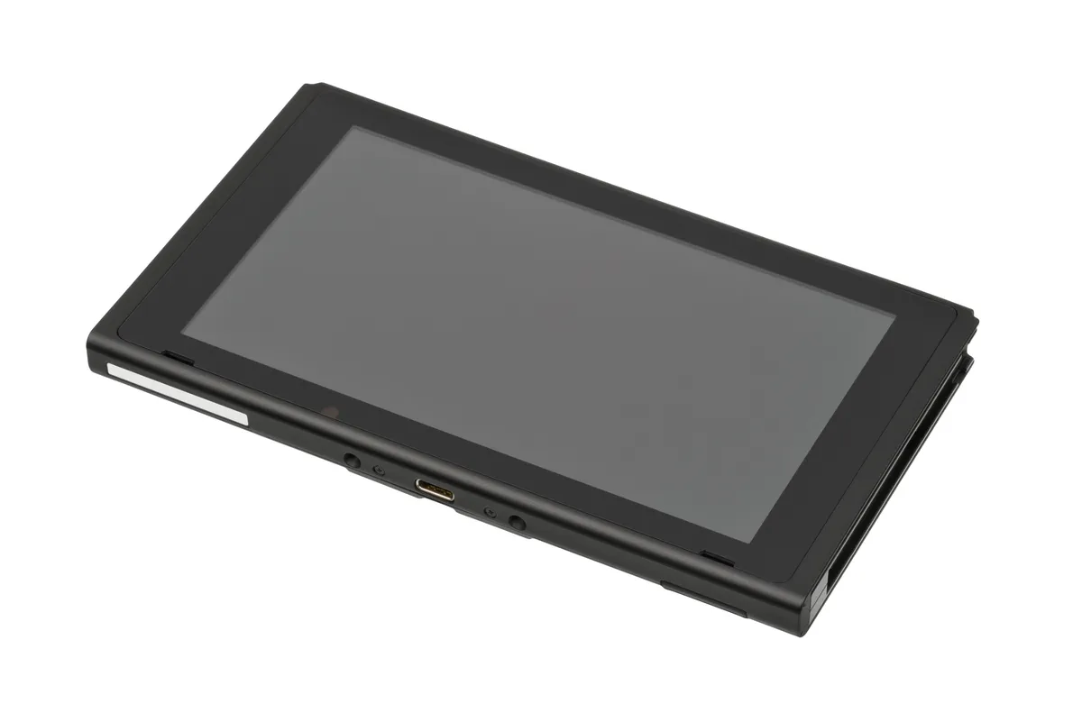 A hybrid handheld console with detachable controllers