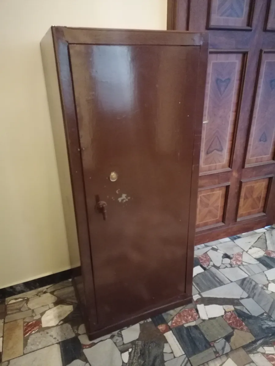 A freestanding home safe with the door closed