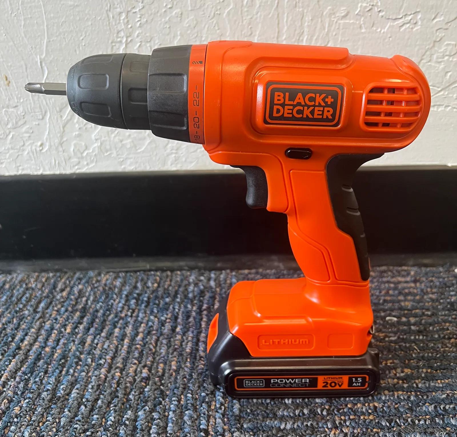 A cordless drill with keyless chuck and clutch collar