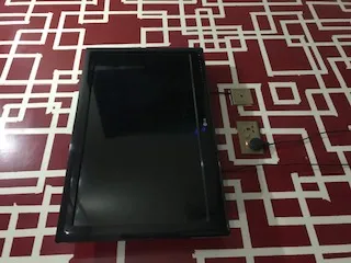 A large flat screen television displaying an image
