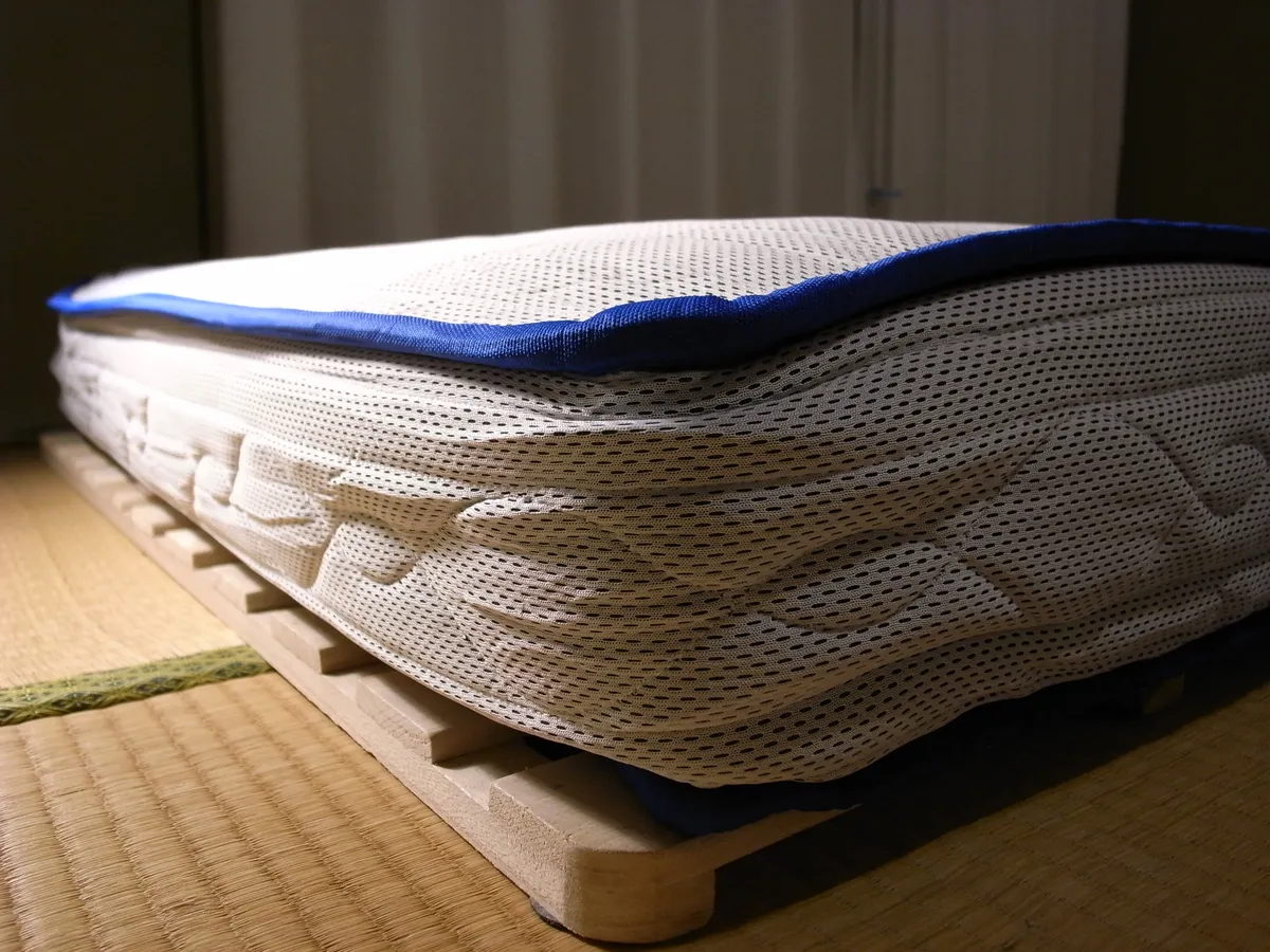 A display showing mattress construction across eras