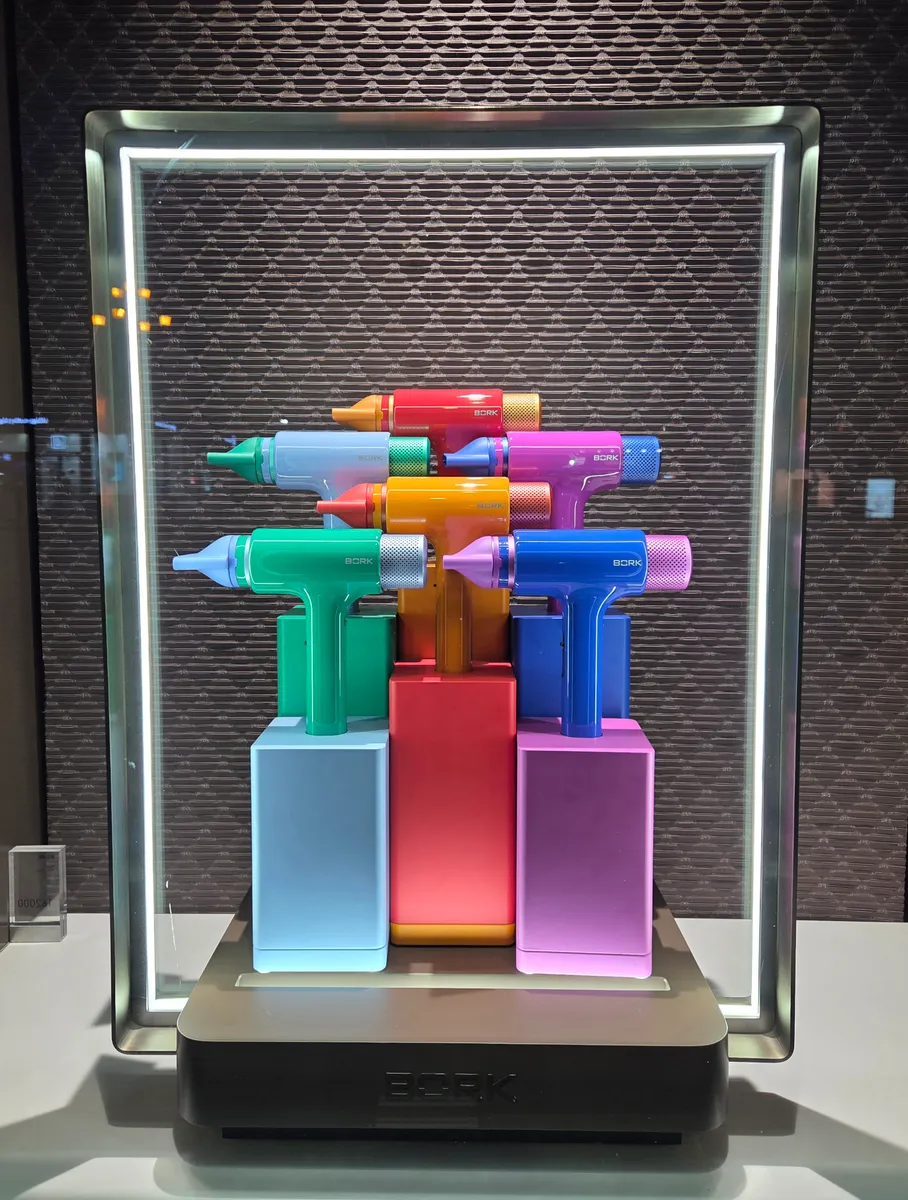 Several hair dryers side by side