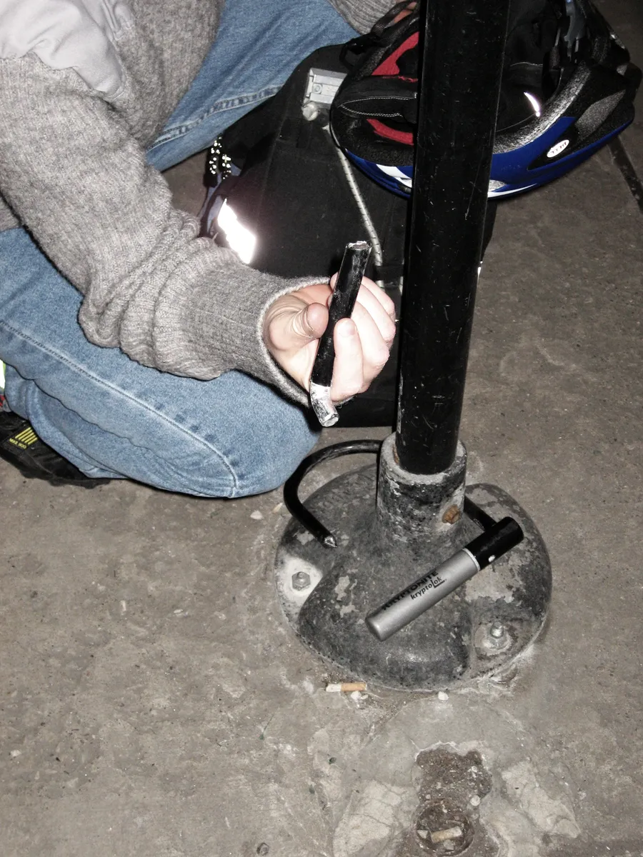 A cut U-lock left behind after a bicycle theft