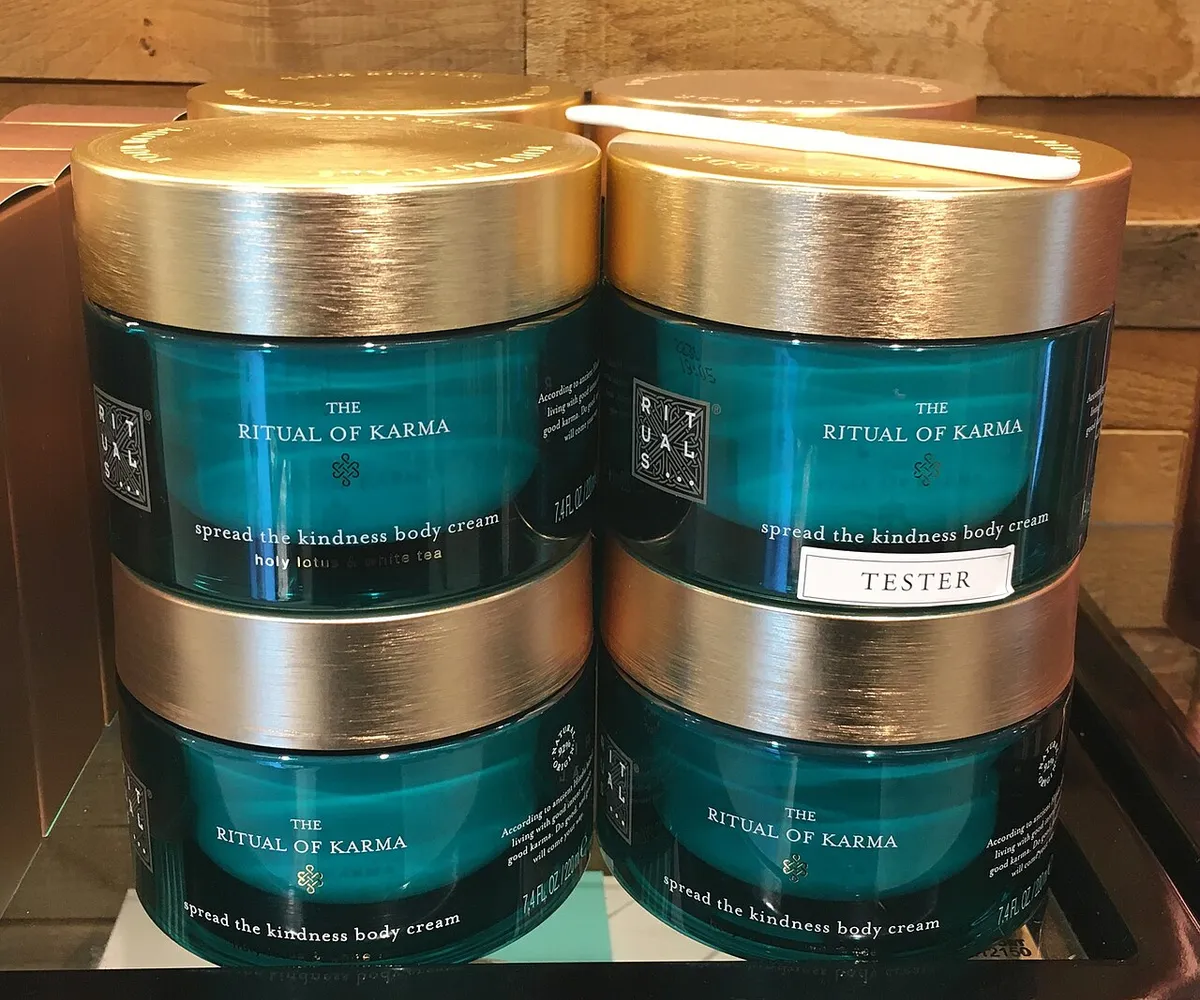 Assorted jars of body cream showing common tub packaging