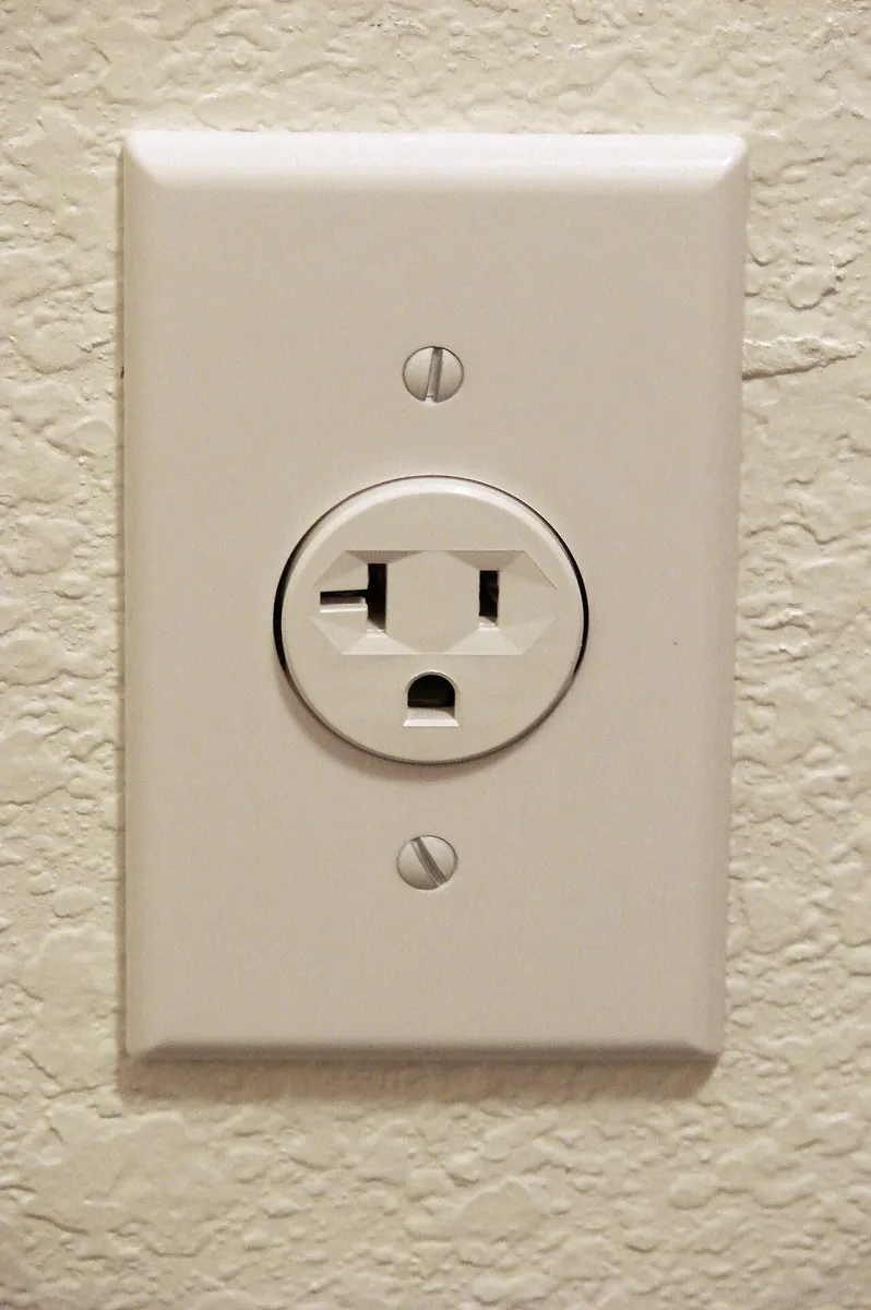Power station plugged into a standard wall outlet to recharge