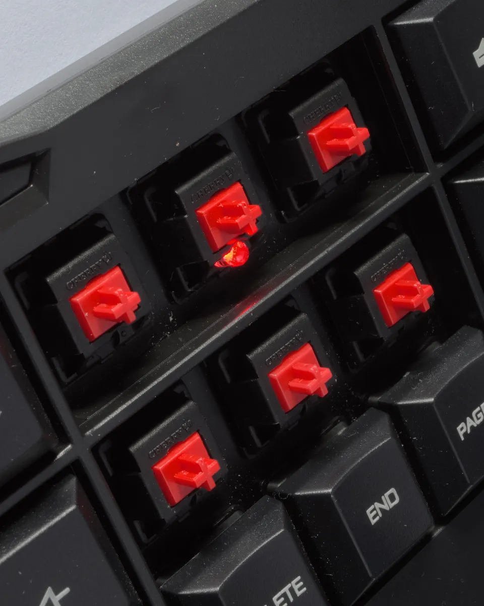 Linear mechanical switches mounted in a keyboard plate
