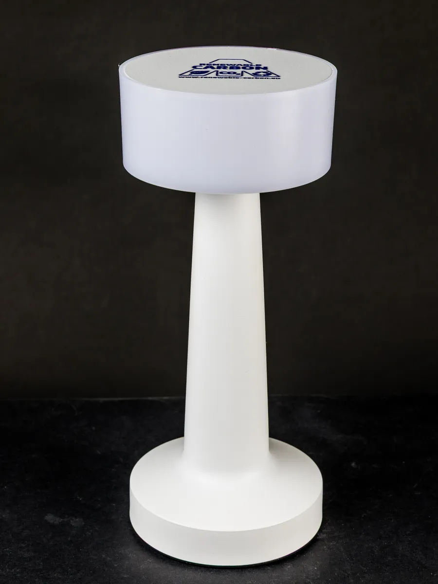 Compact LED desk lamp with adjustable head