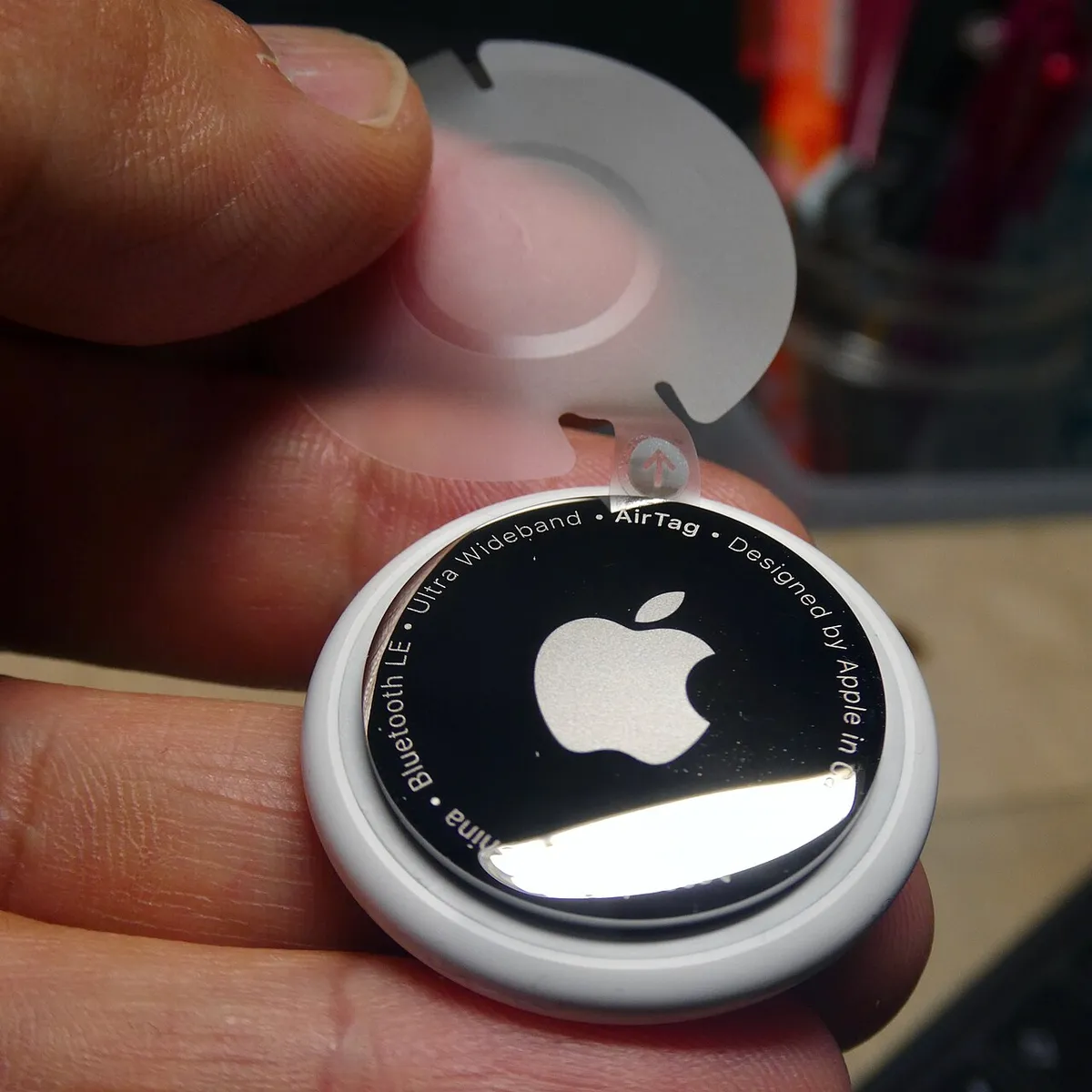 Apple AirTag close-up showing its circular design