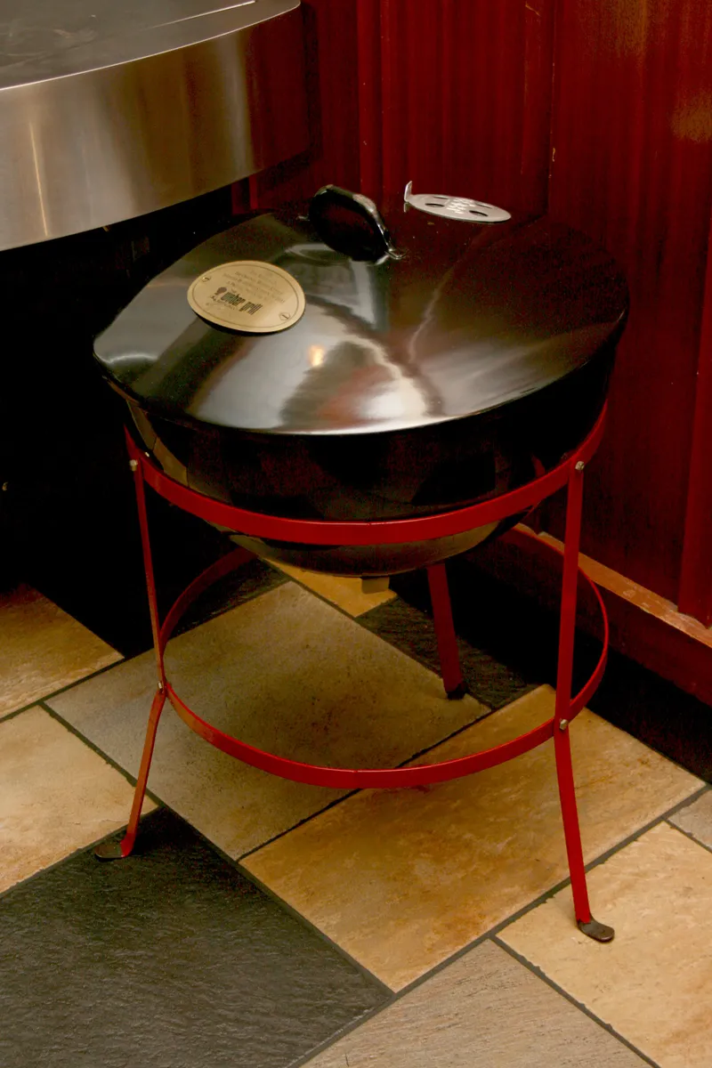 A replica of the original 1951 Weber kettle, showing how little the design has changed