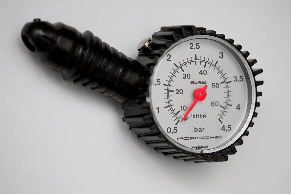 Tire pressure gauge dial showing PSI reading