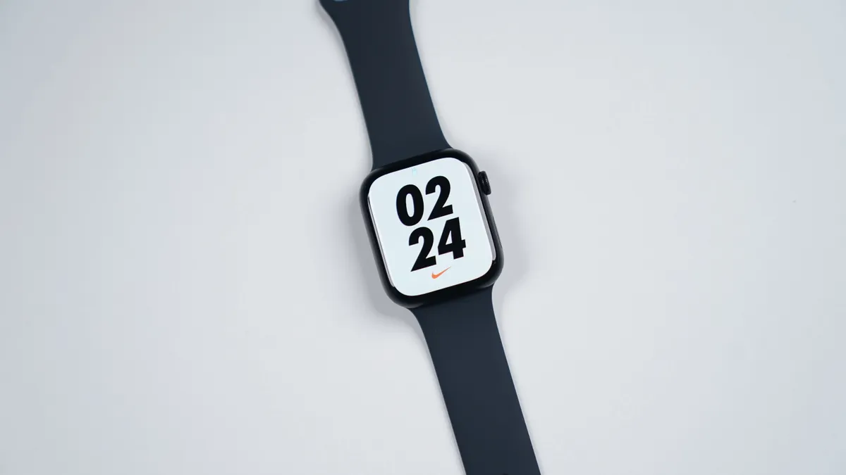 Close-up view of an Apple Watch display and digital crown
