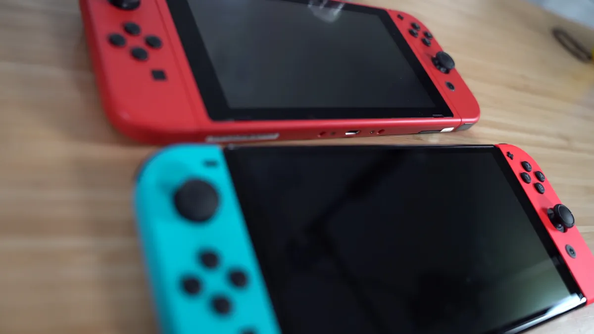 Nintendo Switch OLED console with Joy-Con controllers attached