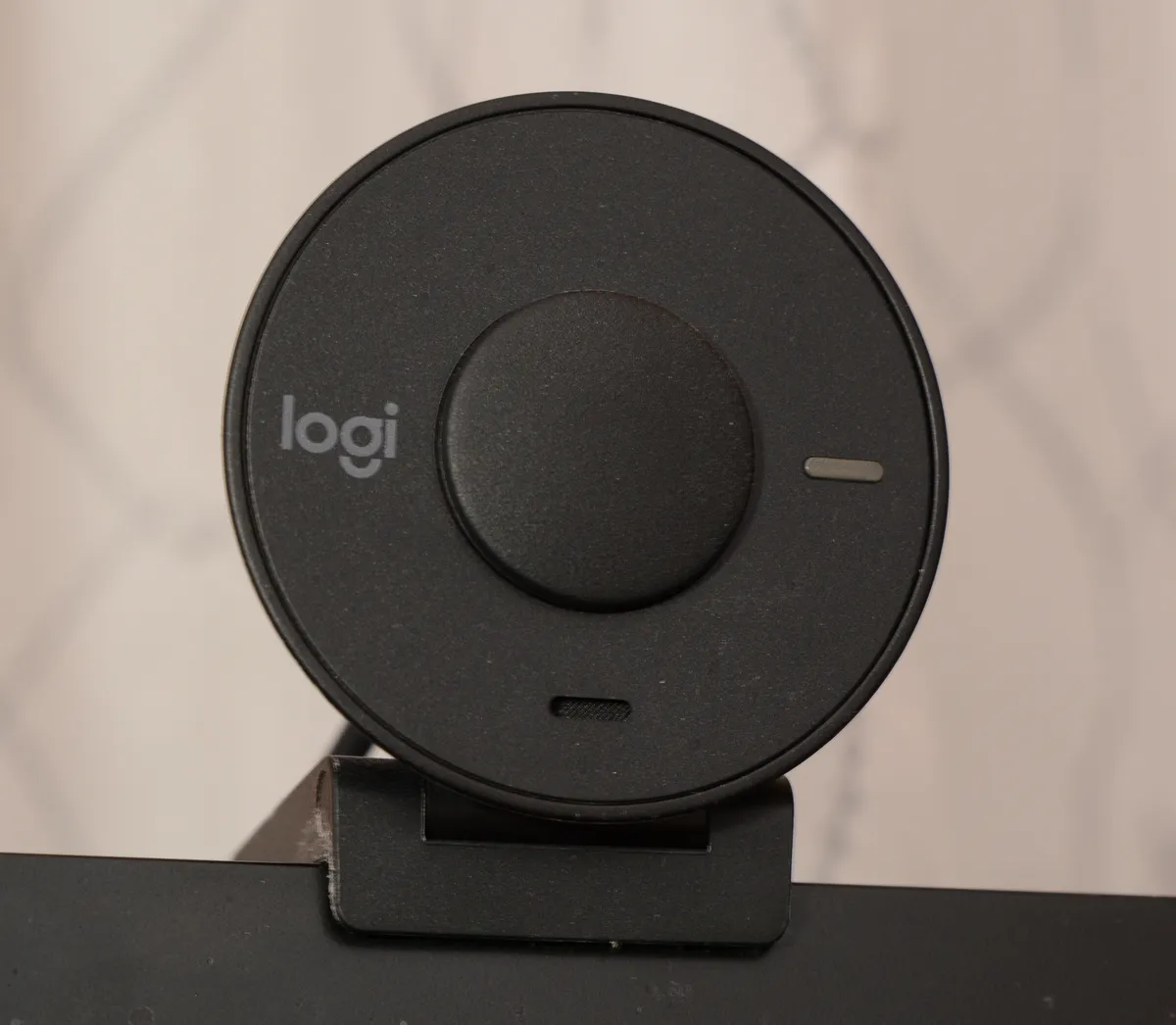 Close-up of the Logitech Brio webcam lens and sensor housing