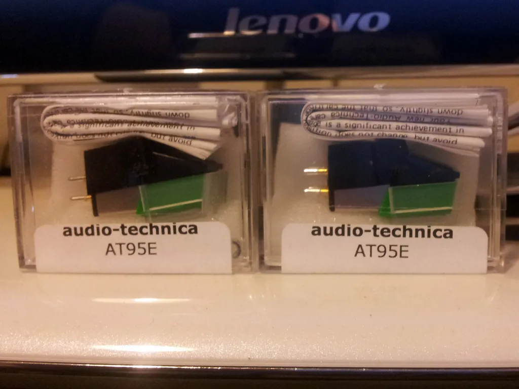 An Audio-Technica AT95E moving magnet cartridge, the kind of upgrade a fixed headshell rules out