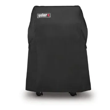 Weber Spirit gas grills fitted with protective covers in a retail display