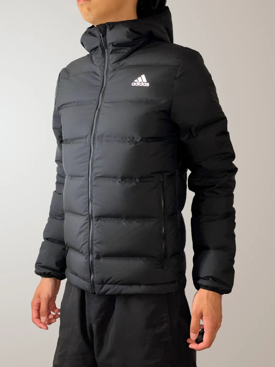 Insulated jacket laid flat, illustrating shell fabric and quilted baffle construction typical of synthetic and down jackets