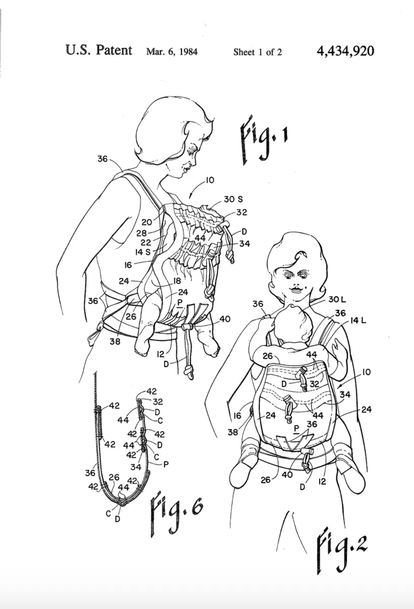 Front view of a structured baby carrier showing the front-facing carrying position and adjustable shoulder straps