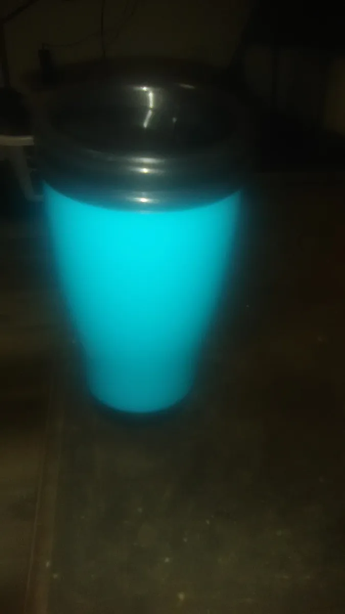 A plain plastic travel mug, representative of a cheaper conventional mug used for comparison