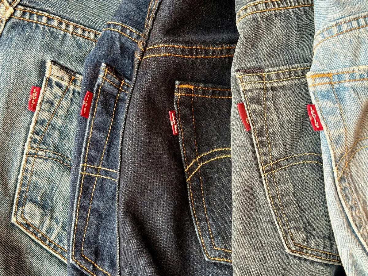 Close-up of the Levi's red tab detail on the back pocket of the 501 jeans