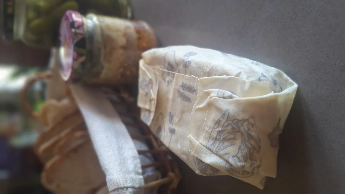 Sandwich wrapped in a beeswax food wrap folded and sealed by hand pressure