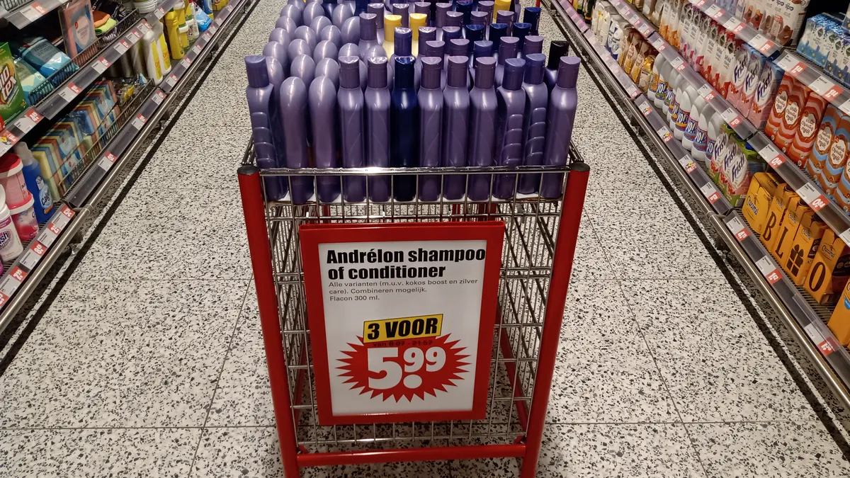 Close view of shampoo and conditioner bottles on a store shelf