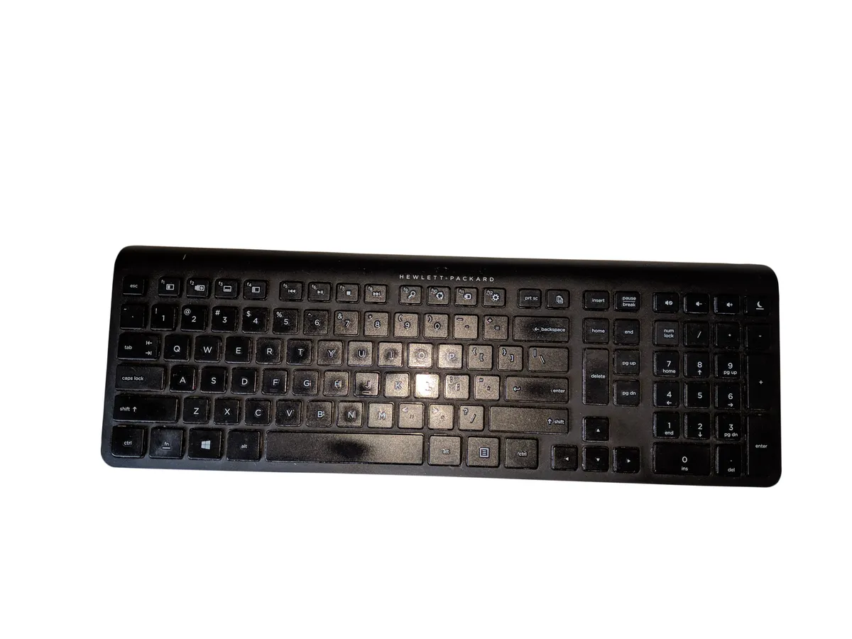 A basic budget wireless membrane keyboard used for comparison