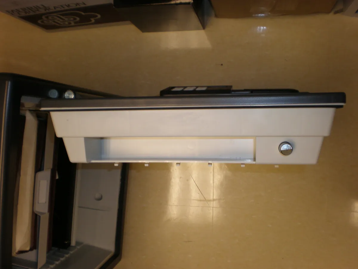 Interior view of a SentrySafe branded fire safe with the door open