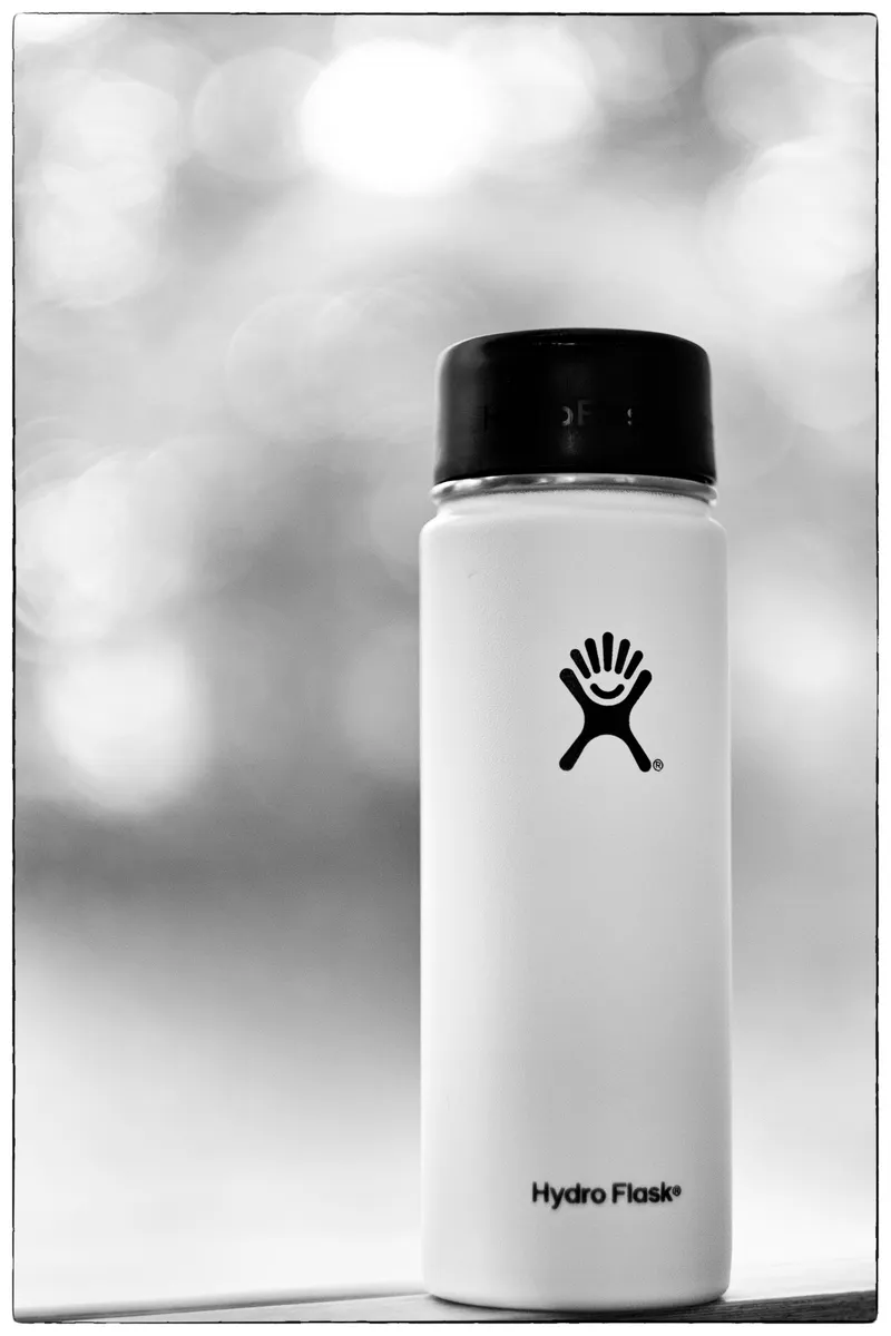 Hydro Flask insulated bottle photographed outdoors on a sunny day