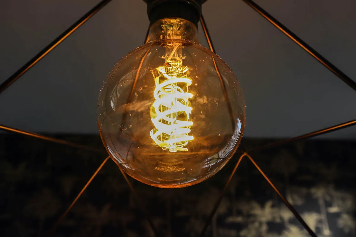 Philips Hue filament-style smart light globe illuminated